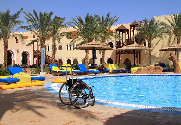 Travel - Disability - Wheelchair - Pool - Sun