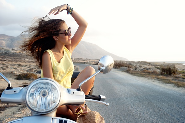 Young female in motorcycle trip