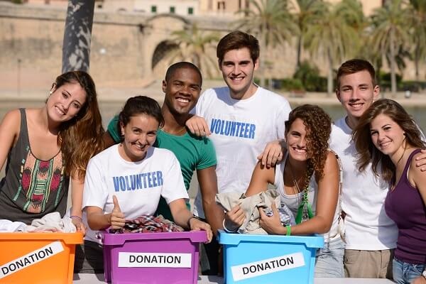 Group of volunteers sorting donations